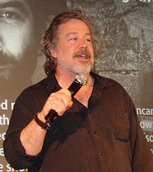 How tall is Tom Hulce?